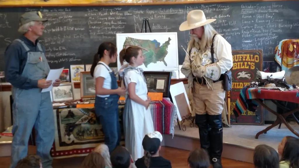 "Buffalo Bill" proudly receives the "key to the city" of Brush, CO from two of its cutest ambassadors!