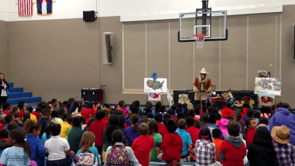 Gunny Jeff Norman as Buffalo Bill Cody at the Global Village Academy