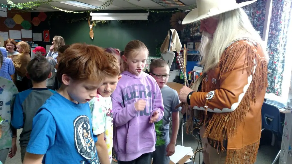 Buffalo Bill always gets ganged up on after a show... the kids especially love the authentic arrow and the old buffalo bladder that Native Americans had several uses for...
